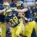 Michigan running back Thomas Rawls celebrates with teammates after scoring a touchdown during spring practice at Michigan Stadium on Saturday, April 13, 2013. Melanie Maxwell I AnnArbor.com